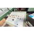Three knives trimmer Kolbus MD 155